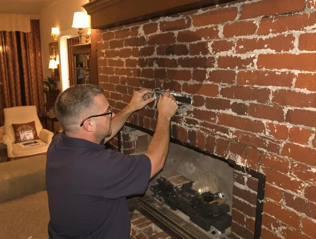 Miami Beach Chimney Sweep expert fixing a fireplace in Miami Beach, FL
